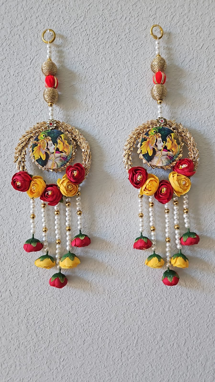 Radha Krishna Wall Hanging with artificial roses