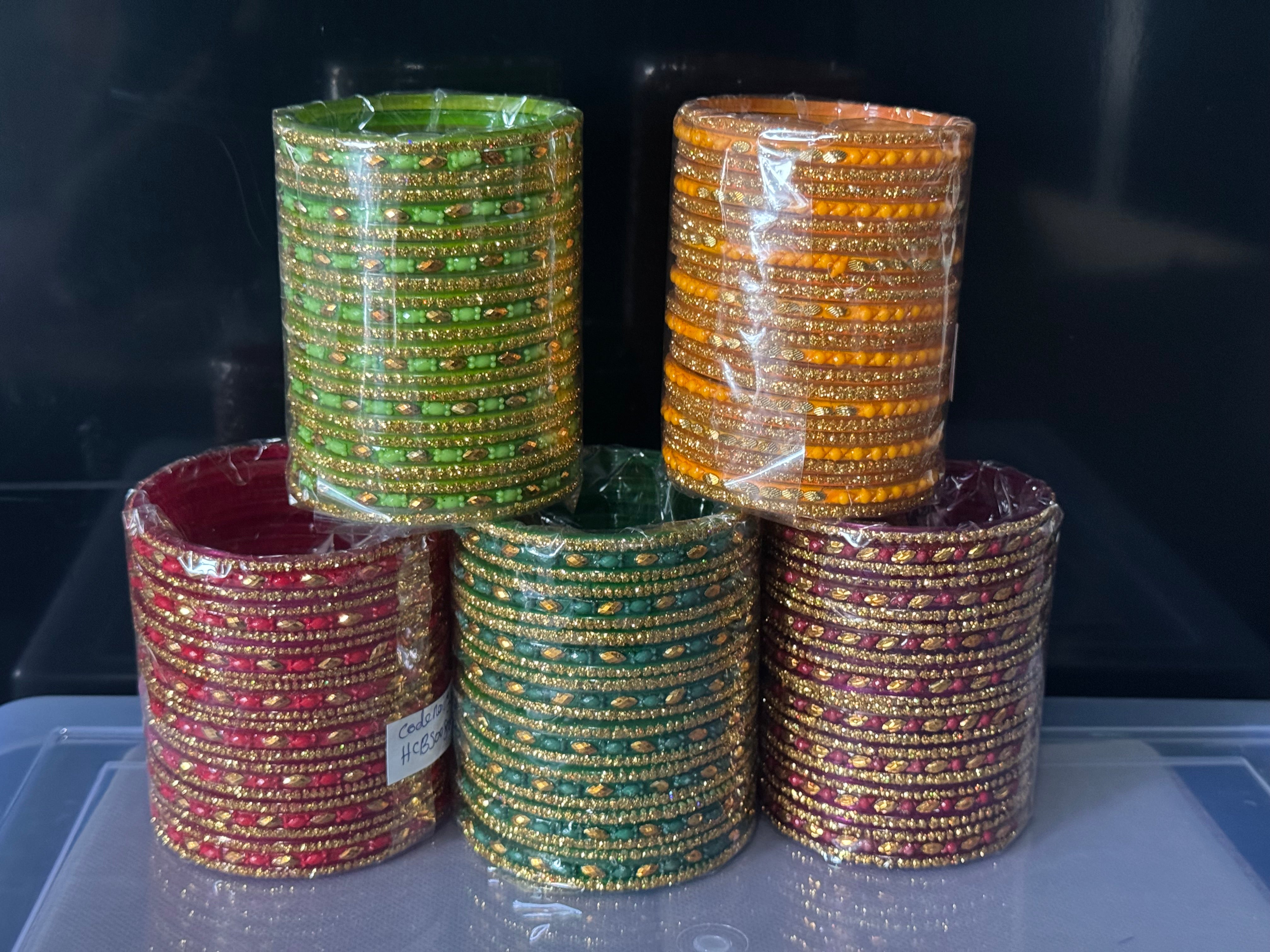 Glass bangles with gold acrylic design