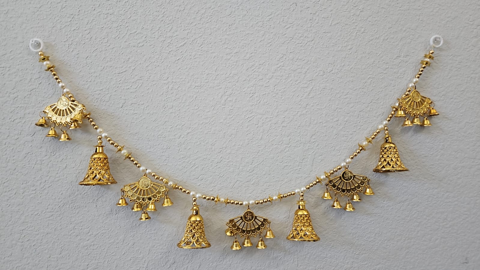 Golden swasthik thoran with beads